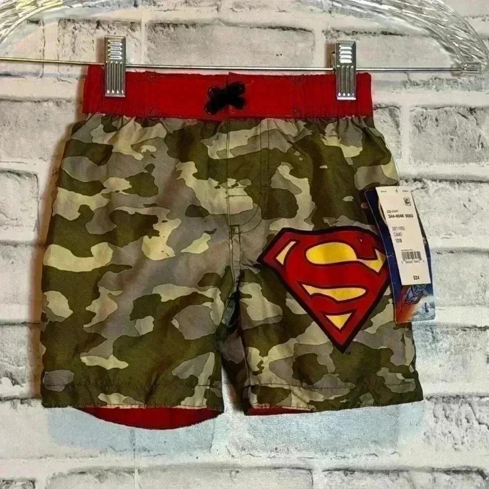 Boys swim trunks super man size 12-18‎ months new with tags camouflage and red